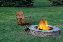 Outdoor fire properly contained within a fire pit